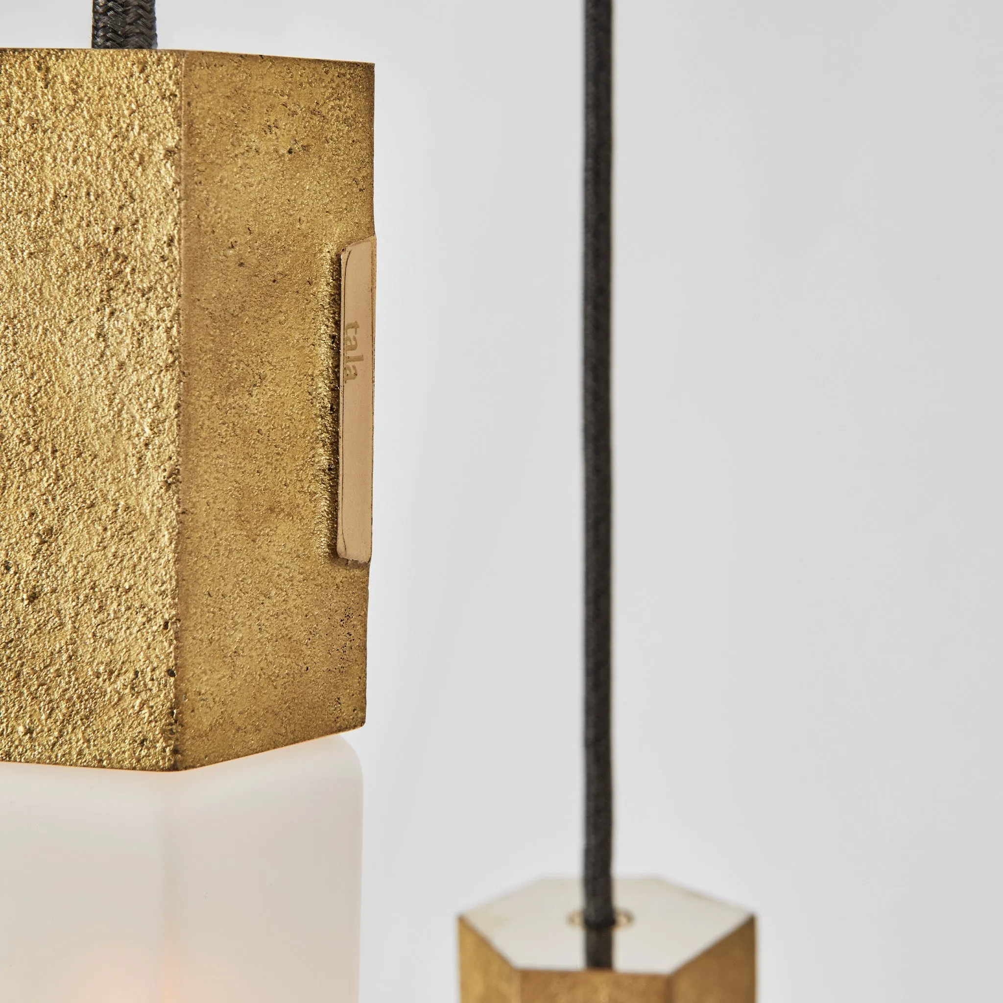 Basalt Nine Pendant in Brass